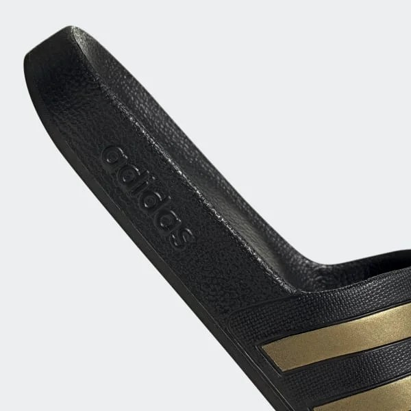 CLAQUETTES CONFORT ADILETTE – ADIDAS – EG1758 – NOIR/GOLD
